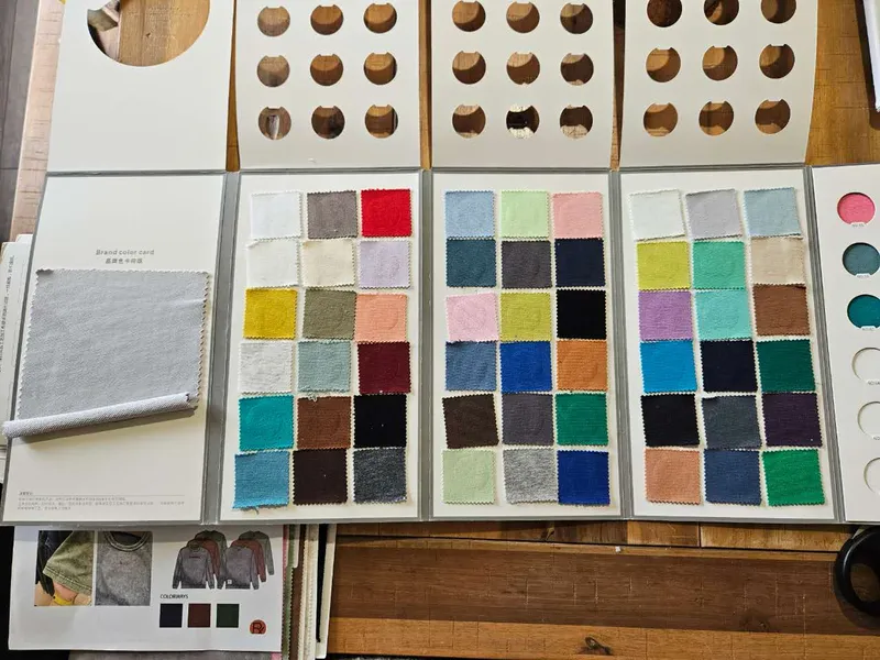 Textile material samples laid out for development review